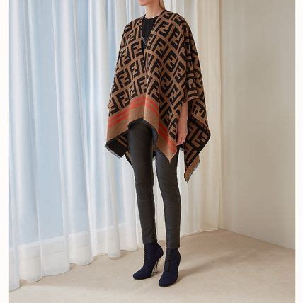 fendi pocho|fendi poncho long fur cape.